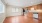 a kitchen with wooden floors