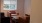 a room with chairs and a coffee table